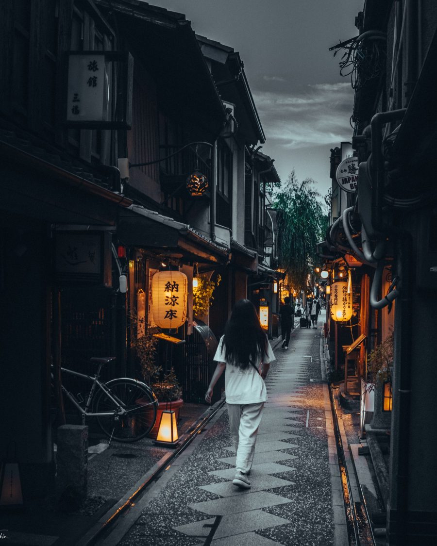 Misty traditional Japanese street at dusk, an anime-production key-art reference